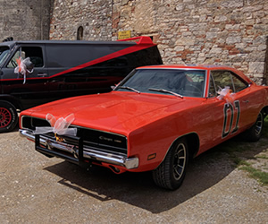 Noleggio General Lee del telefilm Hazzard realizzato su base Dodge Charger del 1969 Noleggio General Lee del telefilm Hazzard realizzato su base Dodge Charger del 1969